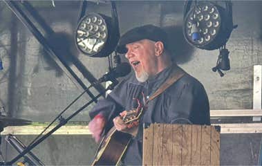 Close up of Ginger Geoffrey singing at Lymelight festival Necastle Under Lyme